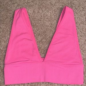 Pink Crop Top Size Xs. Fits sizes XS-M because it is stretchy material!